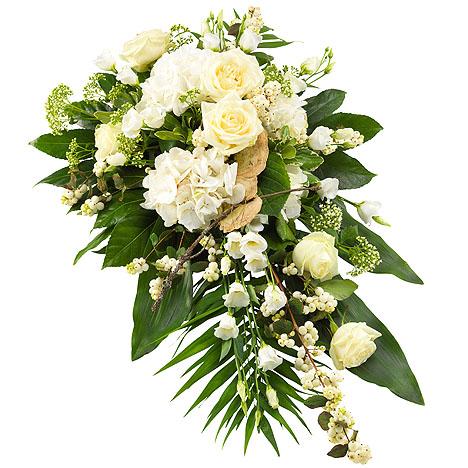 An image of the White and Green Single Ended Spray arrangement, showcasing a delicate blend of white roses, carnations, gypsophila, and white berries. The arrangement emanates a sense of tranquility and offers a serene tribute.